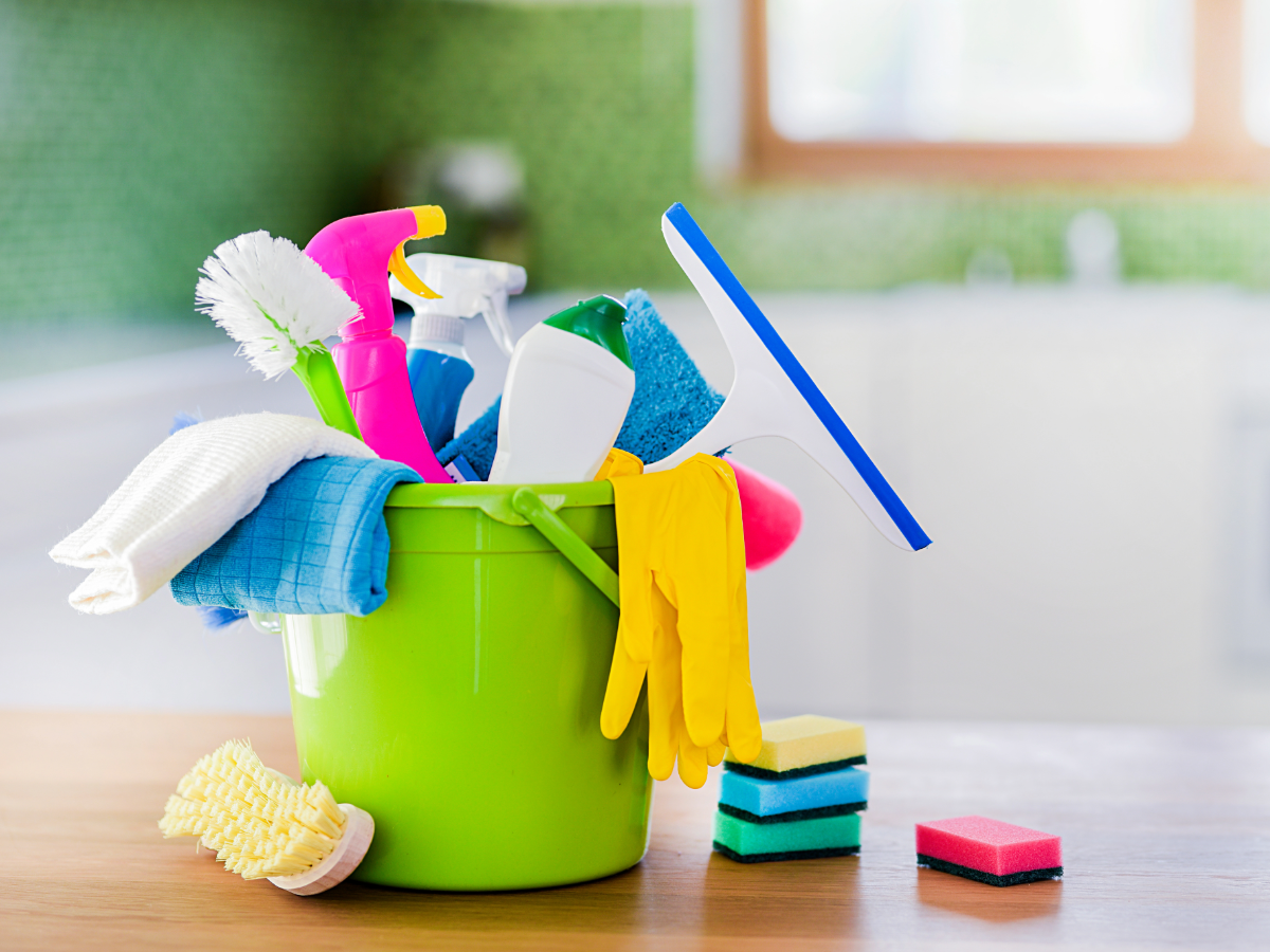 Bucket of cleaning supplies.