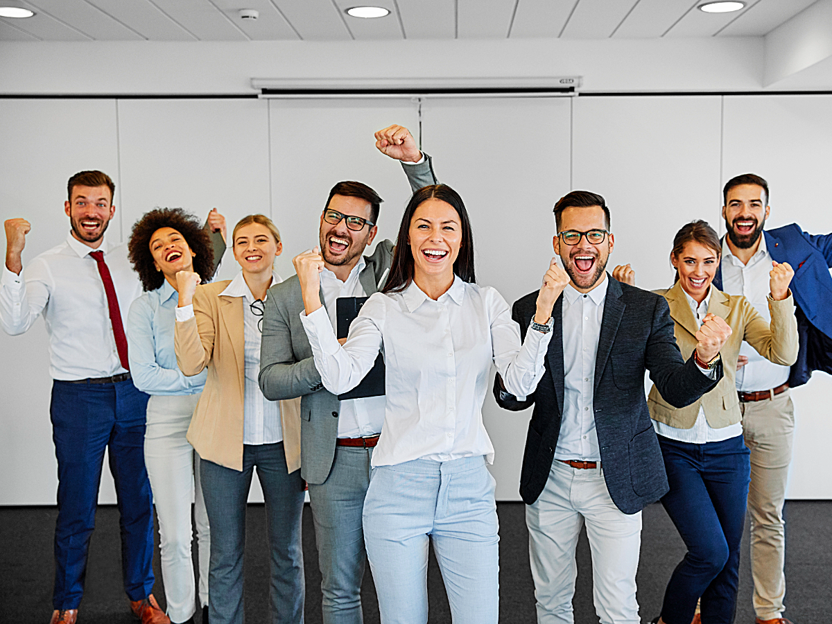 Coworkers cheering.