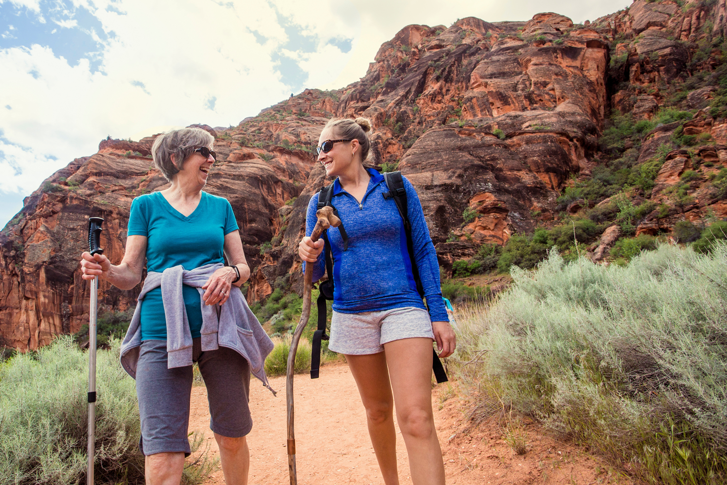 Department graphic: two women hiking