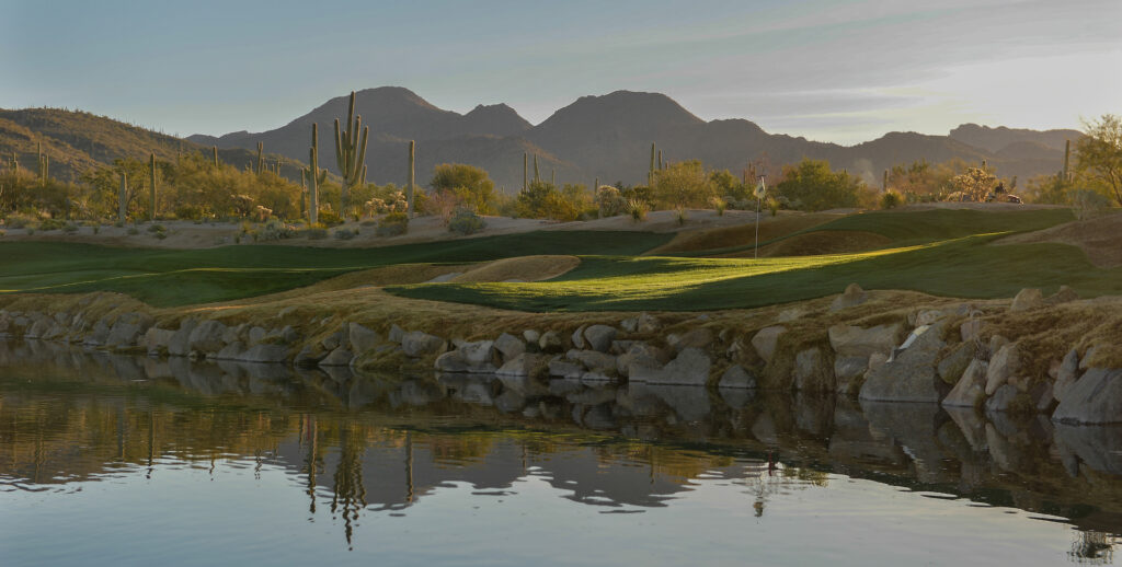 Sunny afternoon view of a golf course hole named Dove Mountain in Tucson, AZ.